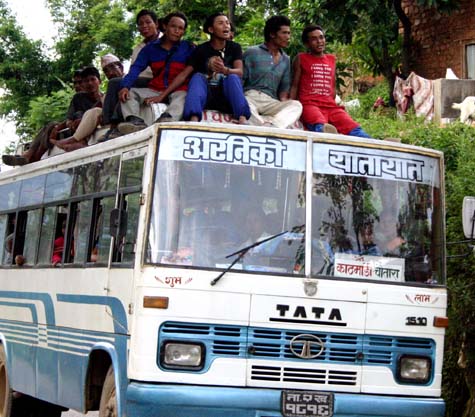 Riding the bus to Ganesh's village